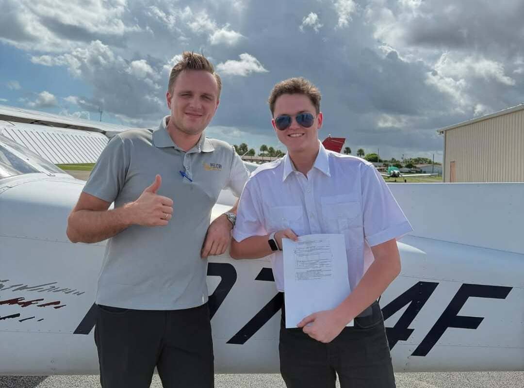 Two smiling pilots